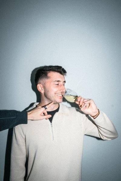 Sharing a playful toast with Wine Donkey Assyrtiko—perfectly paired with good music, friends, and light bites